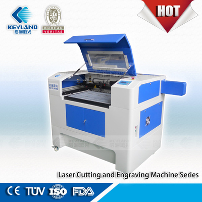 2015 new price usb interface red dot laser engraving cutting machine co2 laser cutter engraver for wood fabric acrylic